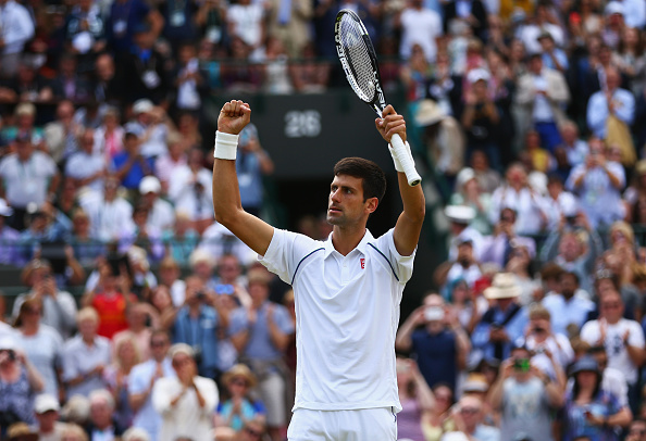 LONDON, ENGLAND - JULY 07:  Novak Djokovic of Serbia celebrates after winning his Gentlemens Singles Fourth Round match against Kevin Anderson of South Africa during day eight of the Wimbledon Lawn Tennis Championships at the All England Lawn Tennis and Croquet Club on July 7, 2015 in London, England.  (Photo by Clive Brunskill/Getty Images)