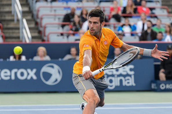 MONTREAL, ON - AUGUST 11:   Novak Djokovic of Serbia returns the ball during day two of the Rogers Cup against  Thomaz Bellucci of Brazil at Uniprix Stadium on August 11, 2015 in Montreal, Quebec, Canada.  Novak Djokovic defeated Thomaz Bellucci 6-3, 7-6.  (Photo by Minas Panagiotakis/Getty Images)
