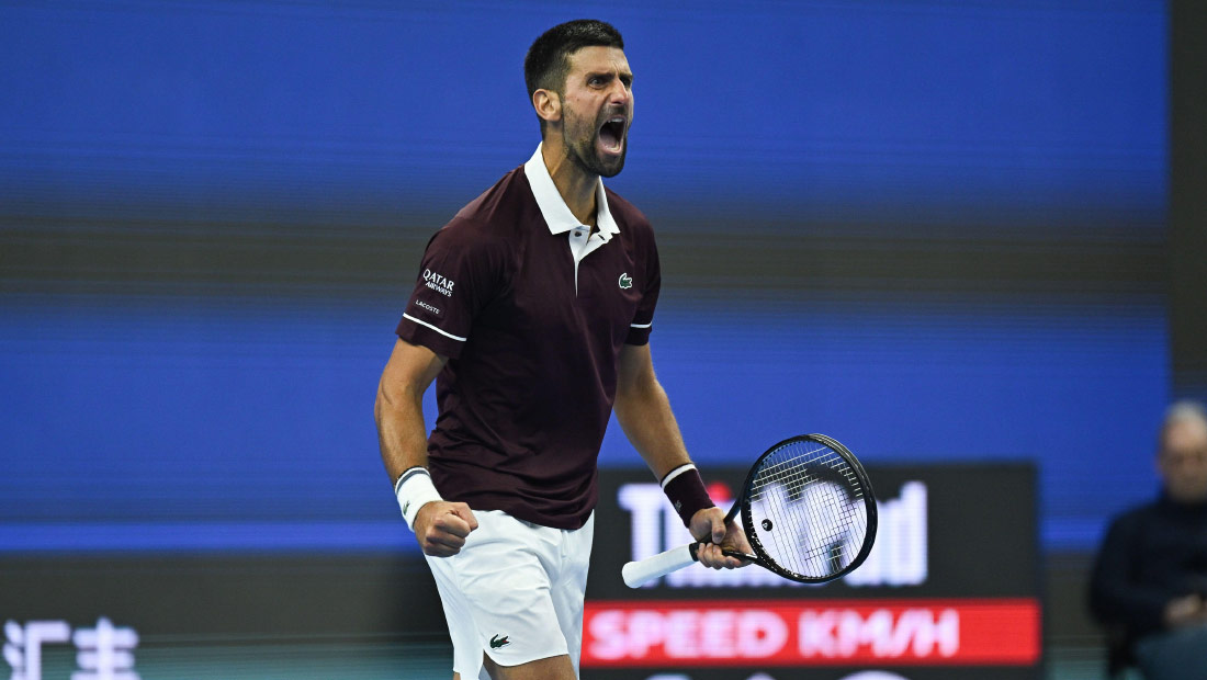 Novak Djokovic celebrates after beating Alexander Zverev in Beijing